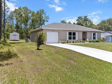 Built in 2023 and thoughtfully upgraded with luxury vinyl plank on Marion Oaks Country Club in Florida - for sale on GolfHomes.com, golf home, golf lot