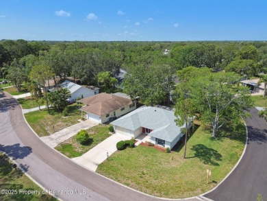 Don't miss this well-maintained Oakmont model featuring 2 on Timber Pines Golf Course in Florida - for sale on GolfHomes.com, golf home, golf lot