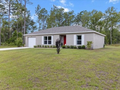 Built in 2023 and thoughtfully upgraded with luxury vinyl plank on Marion Oaks Country Club in Florida - for sale on GolfHomes.com, golf home, golf lot