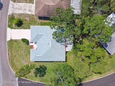 Don't miss this well-maintained Oakmont model featuring 2 on Timber Pines Golf Course in Florida - for sale on GolfHomes.com, golf home, golf lot