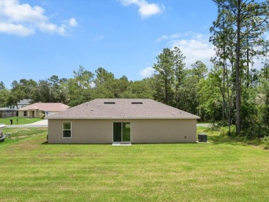 Built in 2023 and thoughtfully upgraded with luxury vinyl plank on Marion Oaks Country Club in Florida - for sale on GolfHomes.com, golf home, golf lot