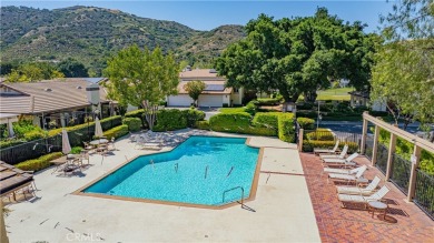 BREATHTAKING MOUNTAIN VIEWS, AS THIS 2 BED, 2.5 BATH CONDO IS on Bear Creek Golf and Country Club in California - for sale on GolfHomes.com, golf home, golf lot