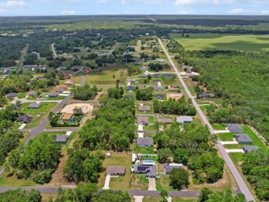 Built in 2023 and thoughtfully upgraded with luxury vinyl plank on Marion Oaks Country Club in Florida - for sale on GolfHomes.com, golf home, golf lot