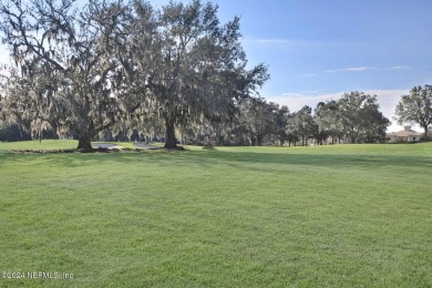 This stunning 4/3 home located in the prestigious King and Bear on King and Bear Golf Course/World Golf Village in Florida - for sale on GolfHomes.com, golf home, golf lot