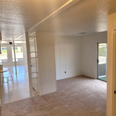 This property has a unique 2 bed/2 bath cozy open floor plan on Palm Desert Greens Country Club in California - for sale on GolfHomes.com, golf home, golf lot