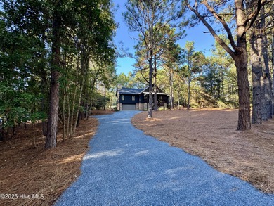 GOLF FRONT! COMPLETELY REMODELED! This stunning 3-bedroom on Seven Lakes Country Club in North Carolina - for sale on GolfHomes.com, golf home, golf lot