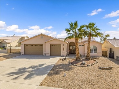 Beautiful 3-bedroom, 2-bath home with a 3-car boat-deep garage on Desert Lakes Golf Course in Arizona - for sale on GolfHomes.com, golf home, golf lot