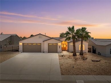 Beautiful 3-bedroom, 2-bath home with a 3-car boat-deep garage on Desert Lakes Golf Course in Arizona - for sale on GolfHomes.com, golf home, golf lot