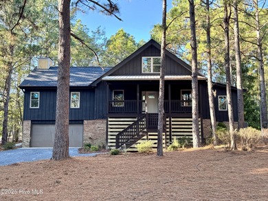 GOLF FRONT! COMPLETELY REMODELED! This stunning 3-bedroom on Seven Lakes Country Club in North Carolina - for sale on GolfHomes.com, golf home, golf lot