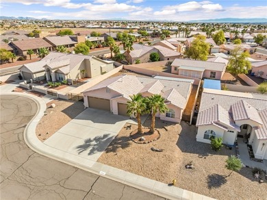 Beautiful 3-bedroom, 2-bath home with a 3-car boat-deep garage on Desert Lakes Golf Course in Arizona - for sale on GolfHomes.com, golf home, golf lot