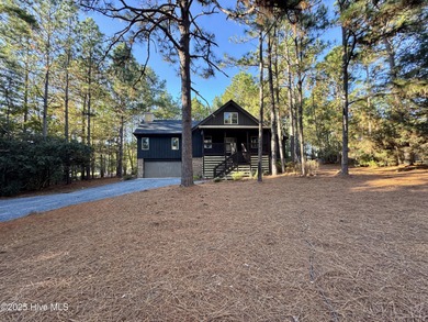 GOLF FRONT! COMPLETELY REMODELED! This stunning 3-bedroom on Seven Lakes Country Club in North Carolina - for sale on GolfHomes.com, golf home, golf lot