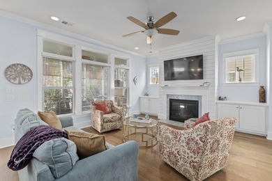 Welcome home to this light-filled coastal retreat tucked inside on Dunes West Golf Club in South Carolina - for sale on GolfHomes.com, golf home, golf lot