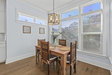 Welcome home to this light-filled coastal retreat tucked inside on Dunes West Golf Club in South Carolina - for sale on GolfHomes.com, golf home, golf lot