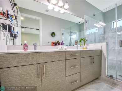 Stunning 2019 townhome located in the highly desirable Enclave on Boca Dunes Golf and Country Club in Florida - for sale on GolfHomes.com, golf home, golf lot