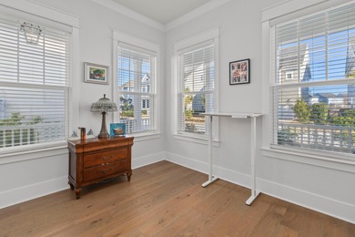 Welcome home to this light-filled coastal retreat tucked inside on Dunes West Golf Club in South Carolina - for sale on GolfHomes.com, golf home, golf lot