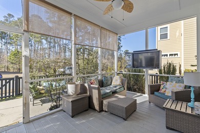 Welcome home to this light-filled coastal retreat tucked inside on Dunes West Golf Club in South Carolina - for sale on GolfHomes.com, golf home, golf lot