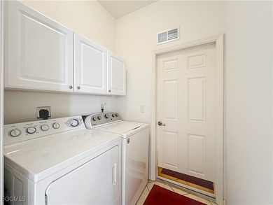 Welcome to this meticulously maintained home in The Meadows on Herons Glen Golf and Country Club in Florida - for sale on GolfHomes.com, golf home, golf lot