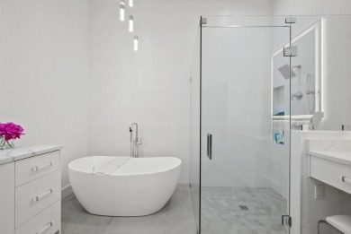 Welcome to this exceptionally renovated 3-bedroom, 2-bathroom on Wycliffe Golf and Country Club in Florida - for sale on GolfHomes.com, golf home, golf lot