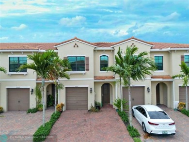 Stunning 2019 townhome located in the highly desirable Enclave on Boca Dunes Golf and Country Club in Florida - for sale on GolfHomes.com, golf home, golf lot