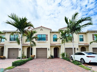 Stunning 2019 townhome located in the highly desirable Enclave on Boca Dunes Golf and Country Club in Florida - for sale on GolfHomes.com, golf home, golf lot