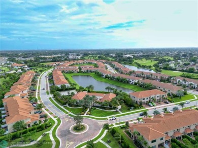 Stunning 2019 townhome located in the highly desirable Enclave on Boca Dunes Golf and Country Club in Florida - for sale on GolfHomes.com, golf home, golf lot