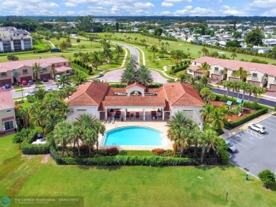 Stunning 2019 townhome located in the highly desirable Enclave on Boca Dunes Golf and Country Club in Florida - for sale on GolfHomes.com, golf home, golf lot