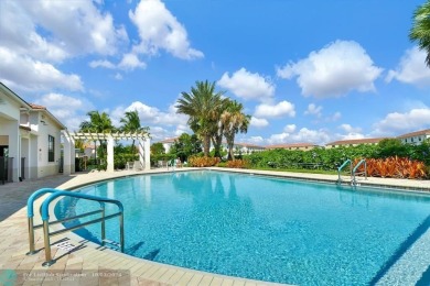 Stunning 2019 townhome located in the highly desirable Enclave on Boca Dunes Golf and Country Club in Florida - for sale on GolfHomes.com, golf home, golf lot