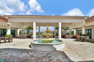 Stunning 2019 townhome located in the highly desirable Enclave on Boca Dunes Golf and Country Club in Florida - for sale on GolfHomes.com, golf home, golf lot