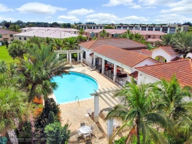 Stunning 2019 townhome located in the highly desirable Enclave on Boca Dunes Golf and Country Club in Florida - for sale on GolfHomes.com, golf home, golf lot