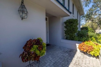 Come experience carefree comfort and a peaceful lifestyle in on Mangrove Bay Golf Course in Florida - for sale on GolfHomes.com, golf home, golf lot