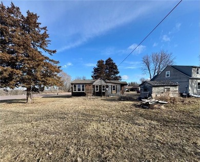 Investor Opportunity! Handyman Special with Great Potential-This on Redwood Falls Golf Club in Minnesota - for sale on GolfHomes.com, golf home, golf lot
