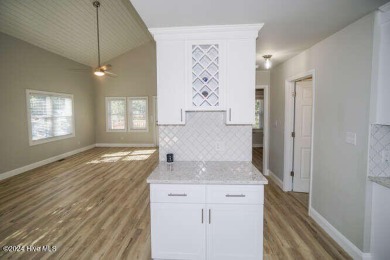 UNBELIEVABLE PRICE PER total Heated SQ. FOOT (Total 2125 ft on Founders Club At St. James Plantation in North Carolina - for sale on GolfHomes.com, golf home, golf lot