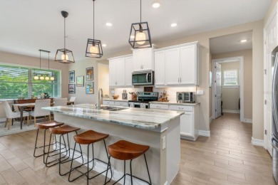 WHY WAIT FOR A NEW BUILD WHEN THIS ONE-YEAR-OLD HOME IN BURNT on Seminole Lakes Country Club in Florida - for sale on GolfHomes.com, golf home, golf lot