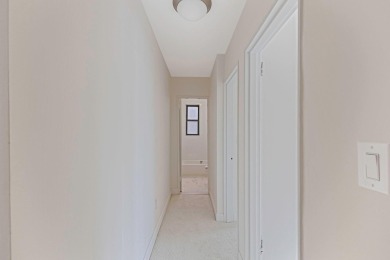 Fully renovated two-bedroom, one-bathroom end unit with elevator on Forest Park Golf Course in New York - for sale on GolfHomes.com, golf home, golf lot