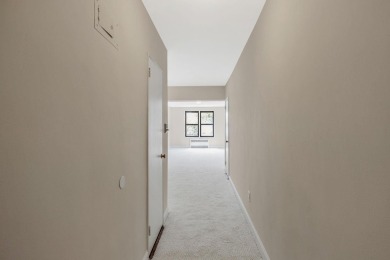 Fully renovated two-bedroom, one-bathroom end unit with elevator on Forest Park Golf Course in New York - for sale on GolfHomes.com, golf home, golf lot