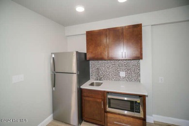UNBELIEVABLE PRICE PER total Heated SQ. FOOT (Total 2125 ft on Founders Club At St. James Plantation in North Carolina - for sale on GolfHomes.com, golf home, golf lot