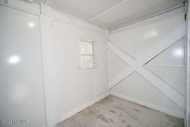 UNBELIEVABLE PRICE PER total Heated SQ. FOOT (Total 2125 ft on Founders Club At St. James Plantation in North Carolina - for sale on GolfHomes.com, golf home, golf lot