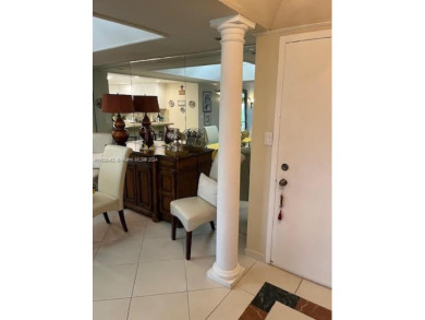 EXPERIENCE THE LUXURY LIVING IN THIS LARGE AND CAPTIVATING 2 BED on Jim McLean Signature Course in Florida - for sale on GolfHomes.com, golf home, golf lot