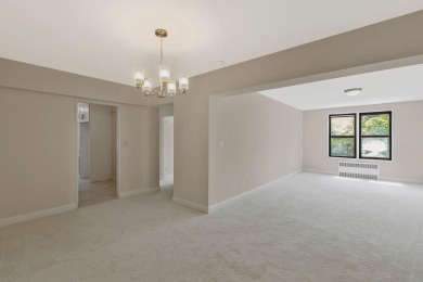 Fully renovated two-bedroom, one-bathroom end unit with elevator on Forest Park Golf Course in New York - for sale on GolfHomes.com, golf home, golf lot