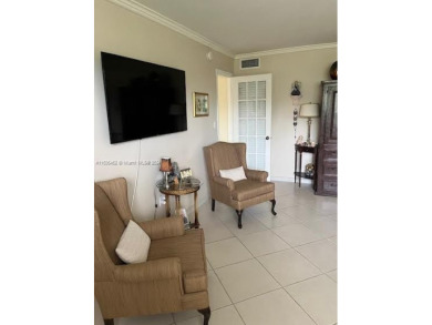 EXPERIENCE THE LUXURY LIVING IN THIS LARGE AND CAPTIVATING 2 BED on Jim McLean Signature Course in Florida - for sale on GolfHomes.com, golf home, golf lot