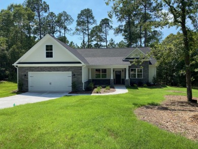 THIS GORGEOUS RANCH HOME HAS 3 BEDROOMS 2.5 BATHS PLUS OFFICE on The Golf Club At Cedar Creek in South Carolina - for sale on GolfHomes.com, golf home, golf lot