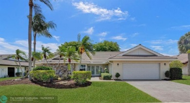 Welcome to your dream home with a New Roof 2020, Impact Windows on Boca Woods Country Club in Florida - for sale on GolfHomes.com, golf home, golf lot