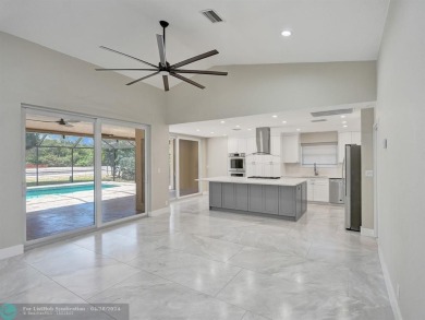 Welcome to your dream home with a New Roof 2020, Impact Windows on Boca Woods Country Club in Florida - for sale on GolfHomes.com, golf home, golf lot