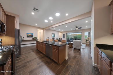 Highly desired 3-bedroom, 2.5-bath home with flex room is on Verrado Golf Club - Victory in Arizona - for sale on GolfHomes.com, golf home, golf lot