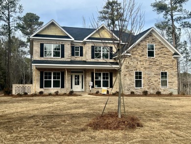 The Emily Plan is located on a golf course lot, and features a on Mount Vintage Plantation and Golf Club  in South Carolina - for sale on GolfHomes.com, golf home, golf lot