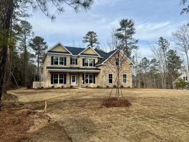 The Emily Plan is located on a golf course lot, and features a on Mount Vintage Plantation and Golf Club  in South Carolina - for sale on GolfHomes.com, golf home, golf lot