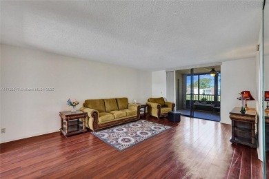 MUST SEE MOVE-IN READY, SPECTACULAR GOLF COURSE VIEWS, 2ND FLOOR on Oriole Golf and Tennis Club in Florida - for sale on GolfHomes.com, golf home, golf lot