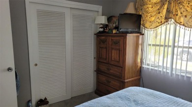 Waterfront GEM! This Mainlands home offers 2 bedrooms, 1 on Mainlands Golf Club in Florida - for sale on GolfHomes.com, golf home, golf lot