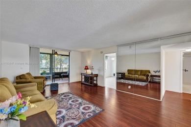 MUST SEE MOVE-IN READY, SPECTACULAR GOLF COURSE VIEWS, 2ND FLOOR on Oriole Golf and Tennis Club in Florida - for sale on GolfHomes.com, golf home, golf lot
