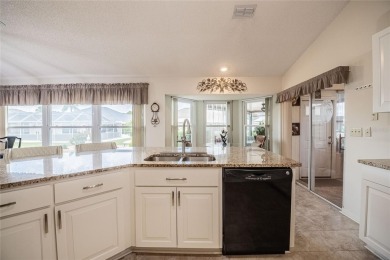 Move-In Ready Expanded Kingston Model in the 55+ Golf Cart on Caloosa Greens Executive Golf Course in Florida - for sale on GolfHomes.com, golf home, golf lot
